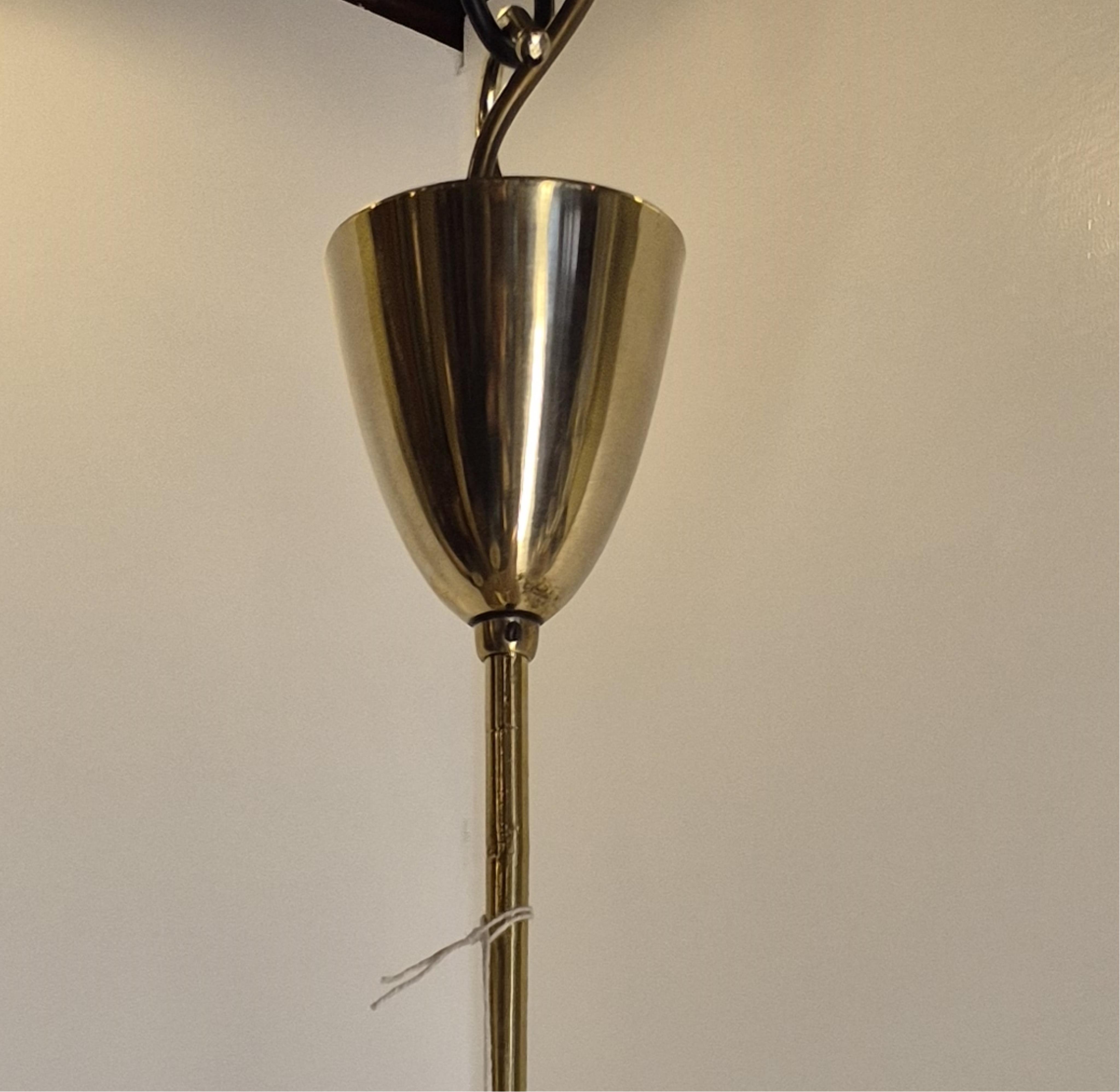 An Italian Retro six light ceiling light with original glass shades, c.1960's-1970's, wired, 66cm high, 70cm diameter